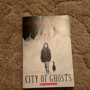 Scholastic City of Ghosts Book Cover – Black, White, Pink